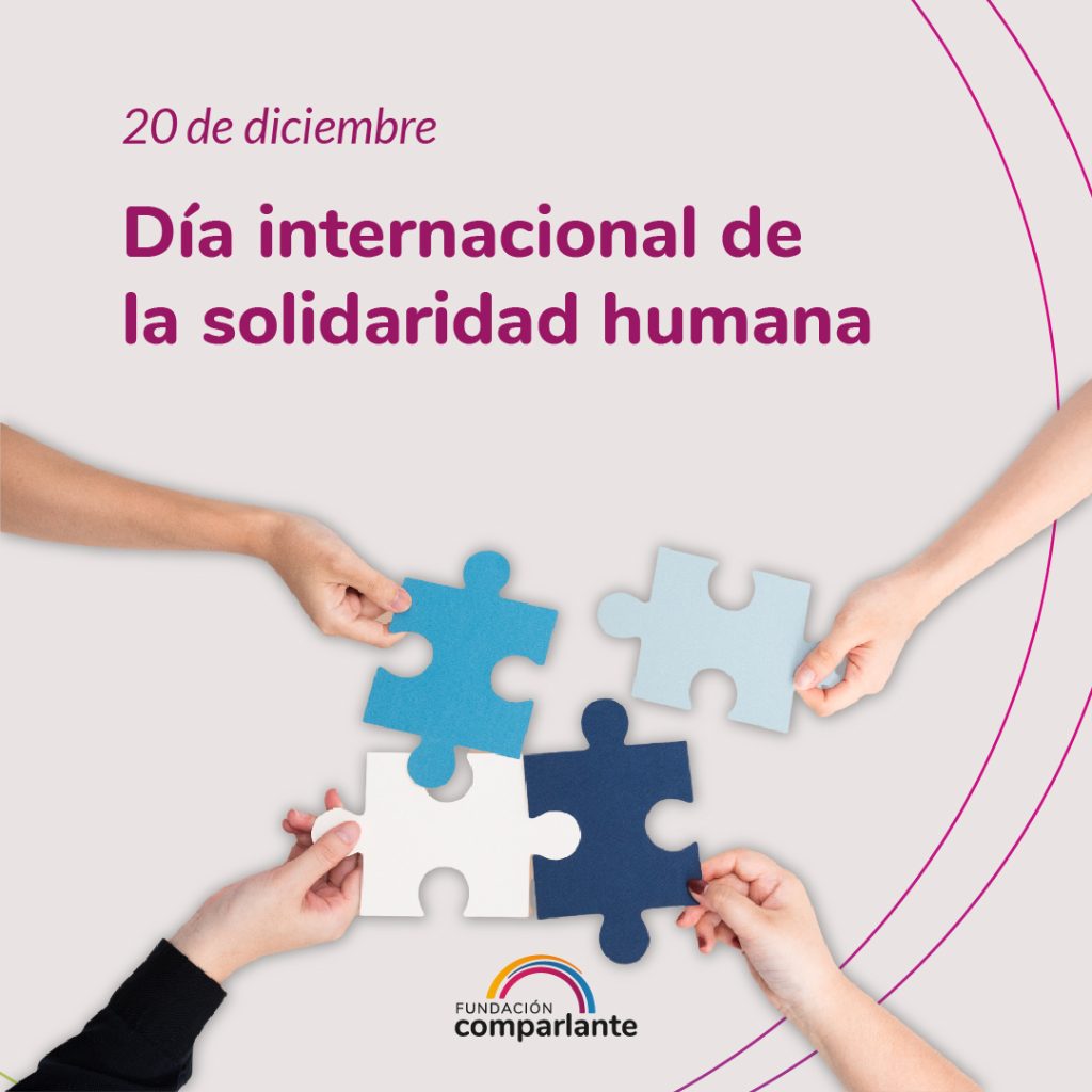 International Day of Human Solidarity". In the lower part of the image there are four hands holding a puzzle piece in different shades of blue. Next to them, the logo of Fundación Comparlante.