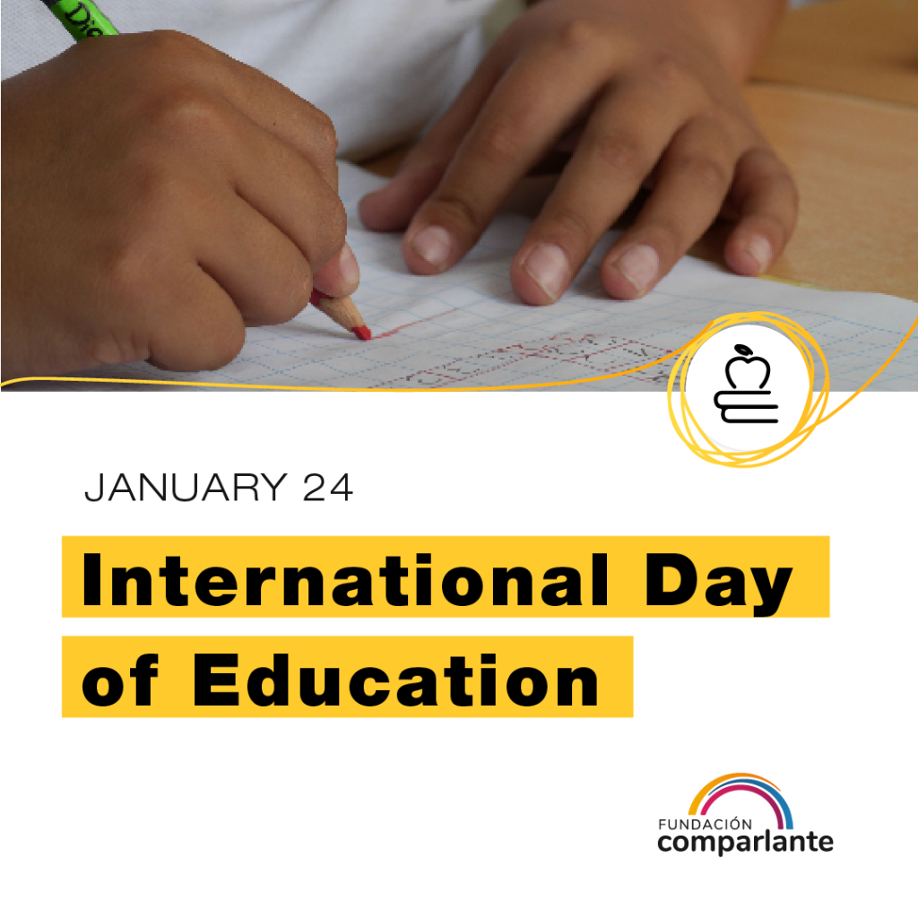 Close-up of the hands of a boy or girl writing with a red pencil in a notebook. Below the text reads: January 24 International Day of Education next to the logo of Fundación Comparlante.