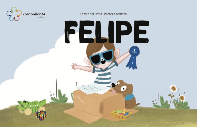 Photo of a boy or girl holding a mobile device such as a tablet. On its screen, there is the cover of the book “Felipe”. Above the title, it says: “Written by David Jiménez Camaño”. Below the title, it is Felipe smiling surrounded by his tows in a green area. Below, on a yellow background, there is the logo of Fundación Comparlante